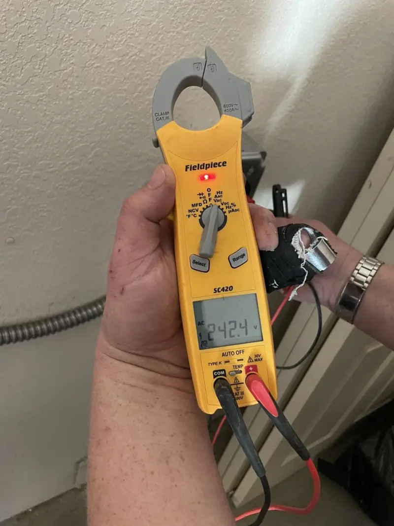 Voltage testing with clamp meter during Ceiling Fan Installation in Gretna